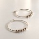 FLOATING BALLS HOOP HAMMERED EARRINGS FLOATING BALLS HOOP HAMMERED EARRINGS