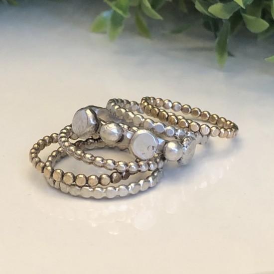 ORGANIC DISCS AND DOTTED STACKING RINGS ORGANIC DISCS AND DOTTED STACKING RINGS