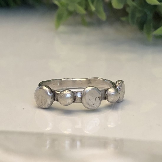 ORGANIC DISCS AND DOTTED STACKING RINGS ORGANIC DISCS AND DOTTED STACKING RINGS